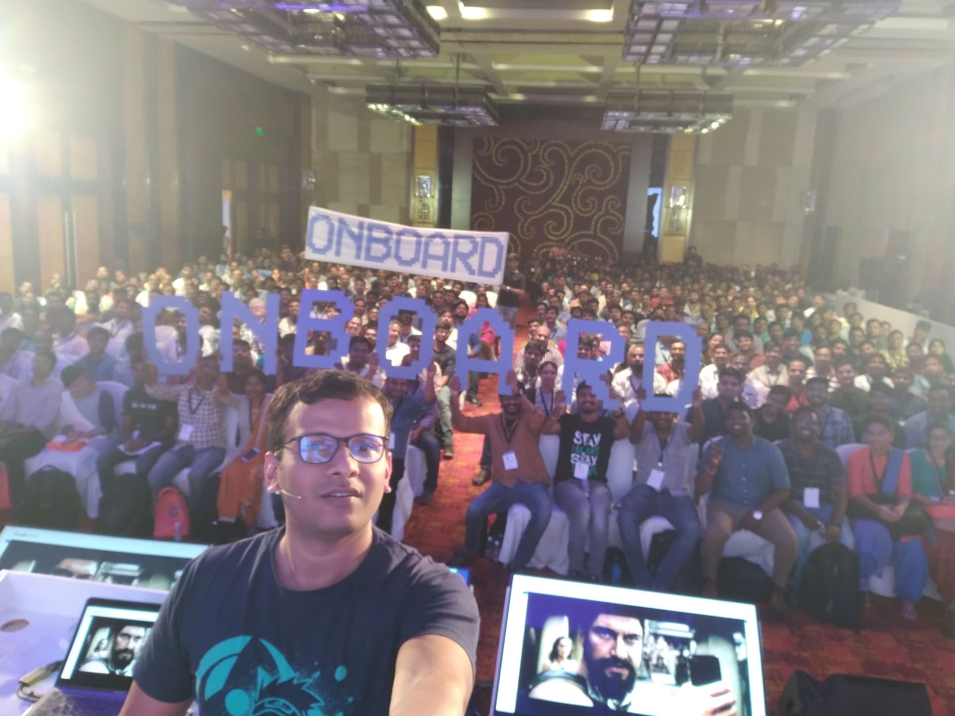 Auditorium event with hundreds of attendees